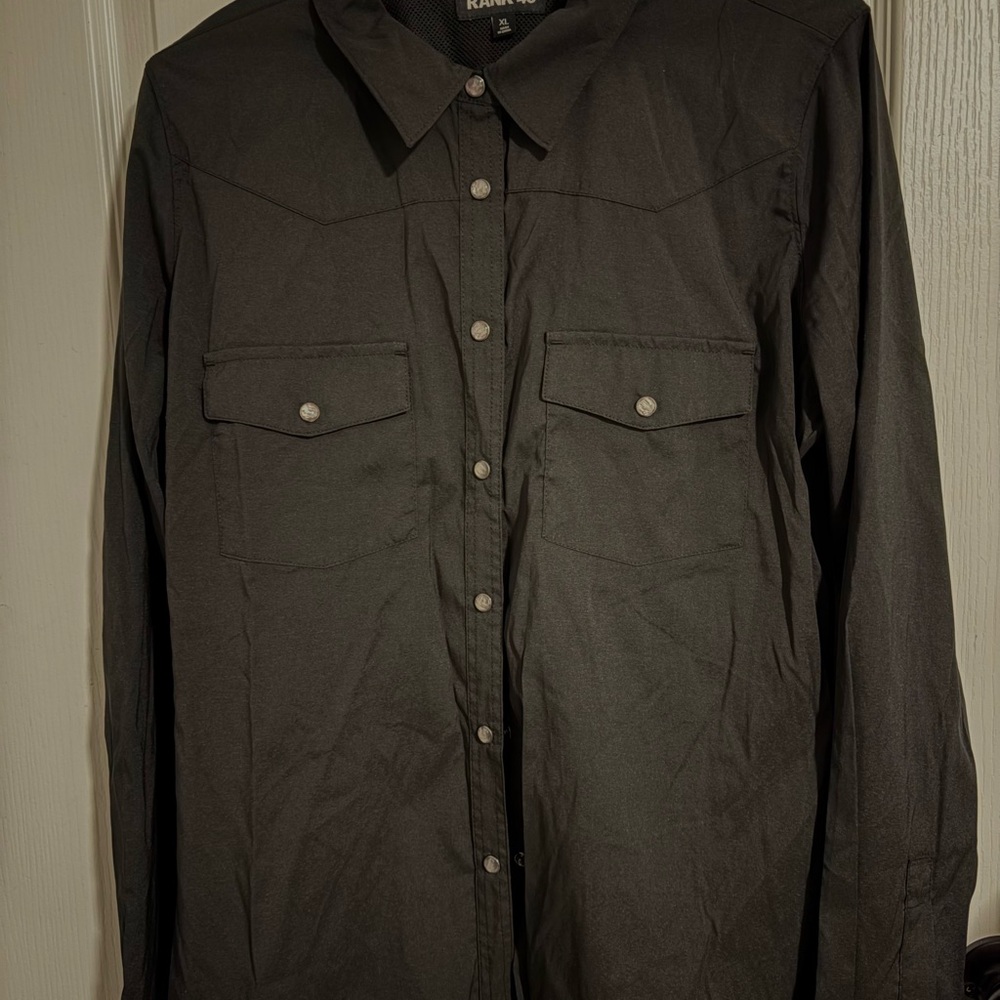 Women’s lightweight black pearlsnap shirt, vented back, poly blend